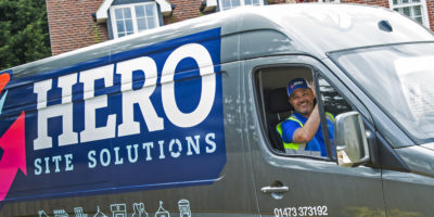 Mike waving from Hero van